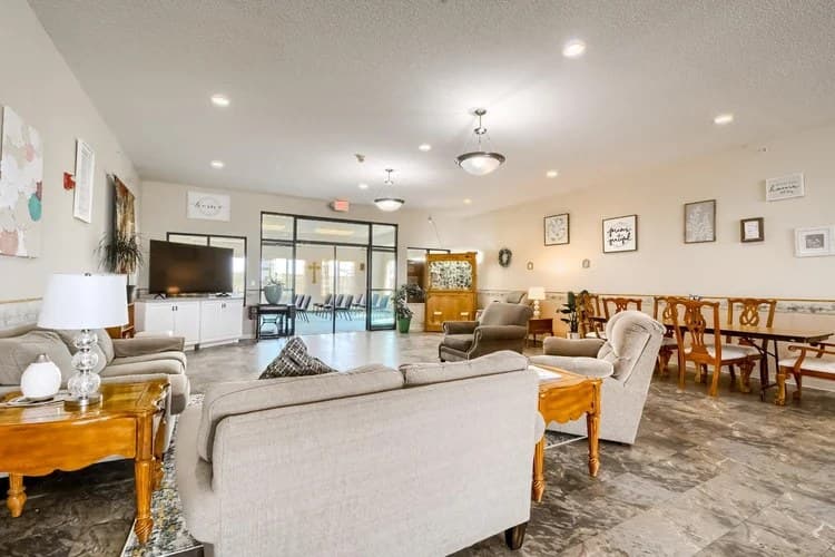 Large living and dining room with television and lounge seating at Aspen Leaf 6th Street