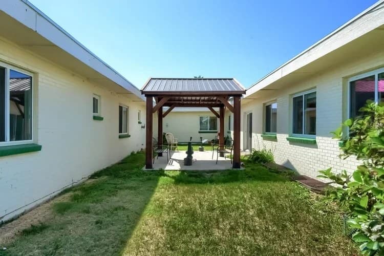 Courtyard with covered gazebo and seating at Aspen Leaf Circle Lane