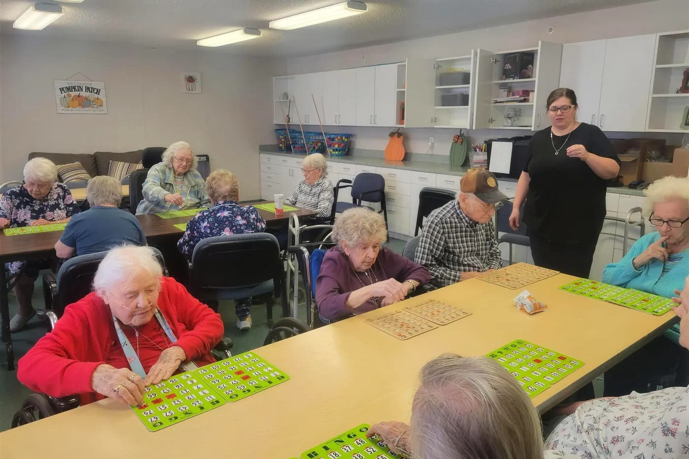 Residents playing bingo together on a weekday afternoon at an Aspen Leaf home