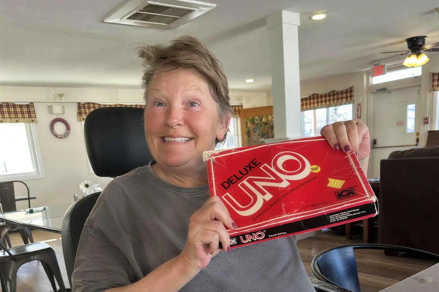 A card game of Uno about to start in the living room of an Aspen Leaf home